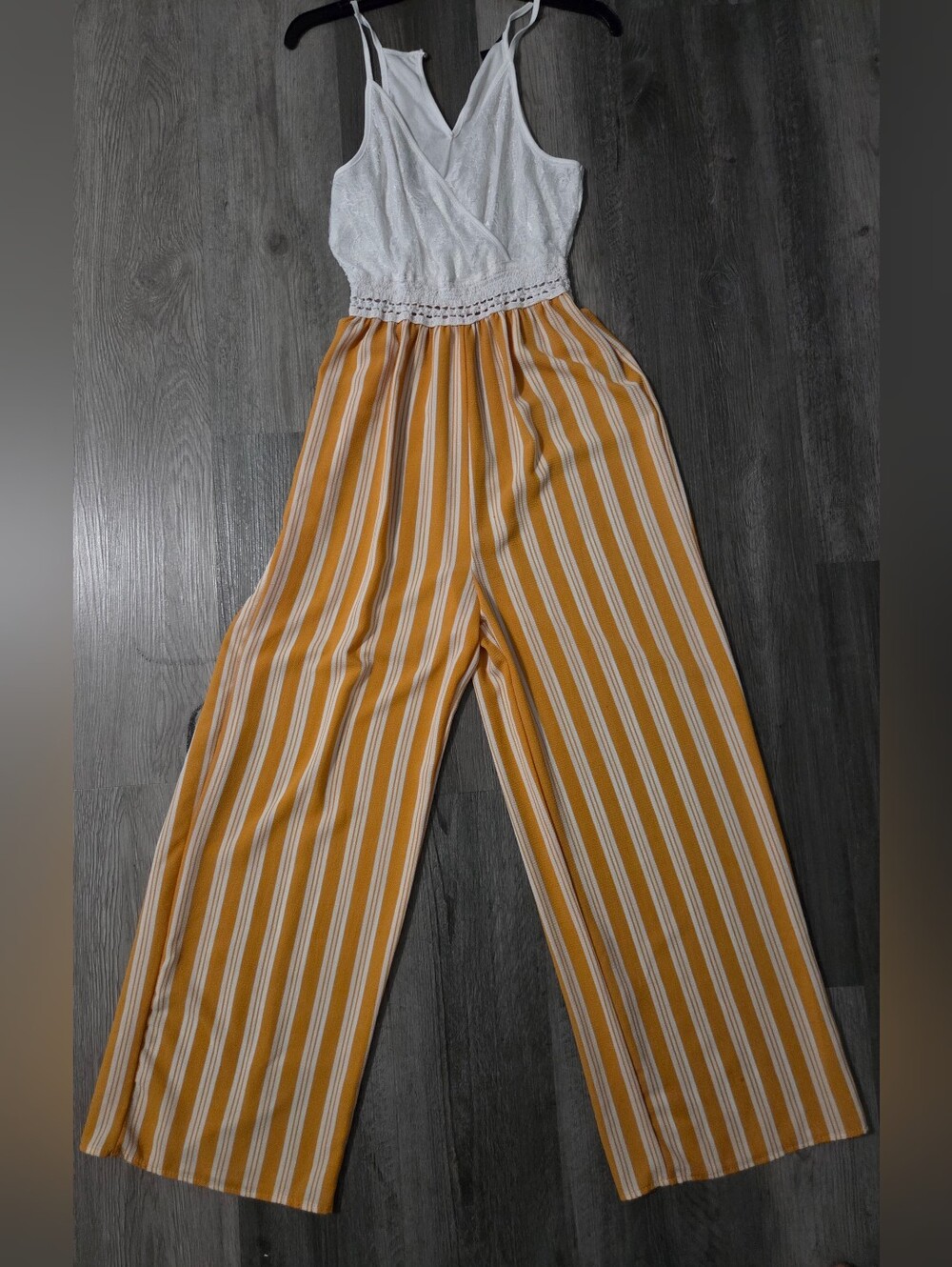 Sleeveless White Crochet Top with Mustard Striped Wide-Leg Jumpsuit